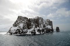 04A Entering The Neptunes Bellows Narrow Opening To Deception Island With Steep Cliffs And Rock Spike On Quark Expeditions Antarctica Cruise Ship.jpg